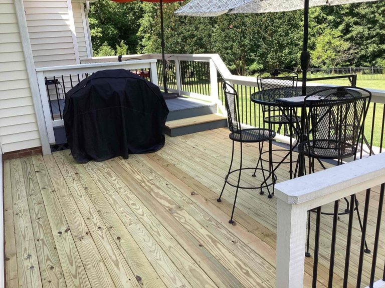 35020614 rebuilt wood deck white railing black balusters clayton 27520 768x576